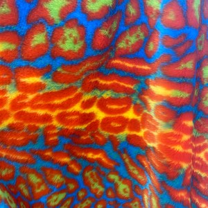Orange / Blue Multi colored Leopard Spotted shaggy short pile faux fur fabric by the yard