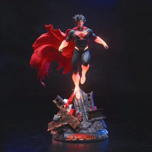 May include: A Superman figurine in a dynamic pose, with a red cape billowing behind him. The figure is clad in a black and red suit, with glowing orange accents. The base features debris and the text "ABSOLUTE SUPERMAN".