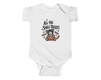 May include: A white short-sleeve baby bodysuit featuring a graphic of a black bear skeleton holding an orange jack-o'-lantern pumpkin. The text "ALL THE SMALL TREATS" is printed above the bear, surrounded by small candy and star illustrations.