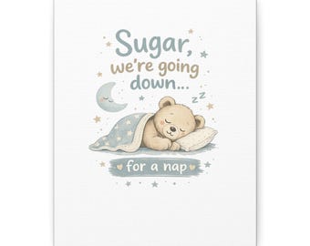 May include: A rectangular wall art print featuring a light brown teddy bear sleeping under a blue star-patterned blanket. The text reads Sugar, we're going down... for a nap, accompanied by a crescent moon, small stars, and sleeping Z symbols.