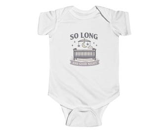 May include: White baby bodysuit with the text "SO LONG AND GOOD NIGHT" above a crib illustration. The design includes stars, a crescent moon, and a mobile. The bodysuit is made of soft fabric.