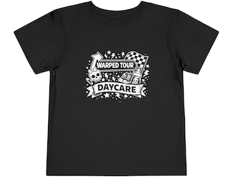 May include: Black toddler t-shirt with a white graphic. The graphic includes the words "Warped Tour Daycare" with a skull, arrow, checkered flag, baby bottle, and sneakers.