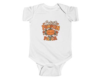 May include: A white short-sleeve baby bodysuit featuring a central graphic of a smiling orange pumpkin surrounded by autumn leaves and small hearts. The text reads Cutest PUMPKIN in the PATCH in orange and brown retro-style lettering.