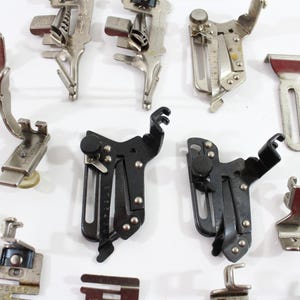 Closeups of available Singer and Simanco sewing machine attachments & some are unmarked.