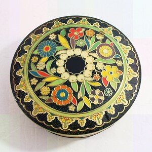 Vintage Daher Tin Round Black with Floral Designs in Yellow Green Red Blue Outlined in Gold, Long Island NY, Made in England