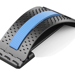 May include: A black back stretcher with a blue center support. The stretcher has multiple small, raised points and is designed to provide back support and pain relief. The product is made of durable plastic and has an adjustable base.