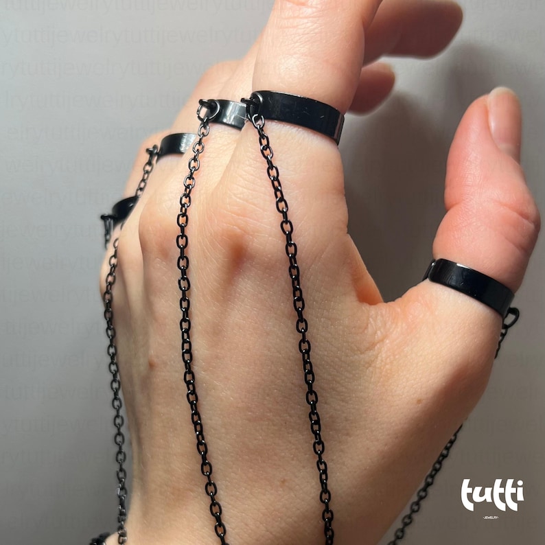 finger chain, finger bracelet, chain link rings, ring with chain, chain bracelet, gothic ring, goth ring,punk ring, y2k ring,goth jewelry, chain ring,costume jewelry, wampire jewelry,gothic jewelry, gemstone ring, dainty ring, garnet ring, Stacking Ring, gift for mom, mothers day gift, gift for her, gift for him, Gifts for Girlfriend, dark jewelry, gothic ring, goth ring, celestial ring, thumb ring, fidget ring, sister ring, witchy ring, gothic jewelry, punk ring, fantasy ring, y2k ring,