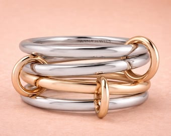 Two-Tone Multi-Band Ring - 4-Piece Linked Silver Ring Set with Rose Gold Plated Jumps