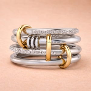 Diamond Link Stack: Four-Piece Ring Set with Gold-Plated Loops Connector Ring