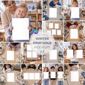 May include: A collection of twenty-two digital mockups featuring blank white rectangular paper sheets in various winter-themed settings, including children holding papers, wooden tables with snowflake decorations, and cosy indoor environments.