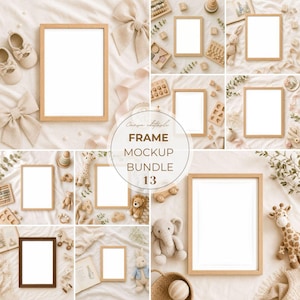 May include: A collection of thirteen rectangular wooden picture frames with white centers, displayed on a soft beige fabric background alongside various plush toys, wooden blocks, and decorative bows in a neutral color palette.