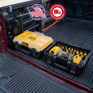 May include: Two black and yellow toolboxes with clear lids sit in the bed of a truck. One toolbox is filled with tools, and the other is empty. The image includes a "Made in USA" sticker and a "Fast Shipping" sticker.