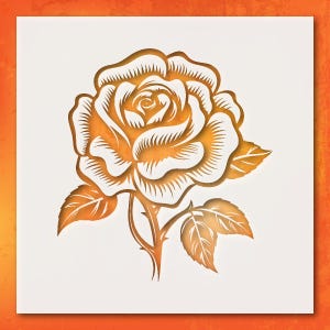 May include: A detailed, golden-colored rose illustration with intricate petal and leaf cutouts. The rose is centered on a white square, set against an orange gradient background. The design showcases a classic floral theme.