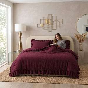 Embrace comfort: Deep Burgundy bedsheets transform the look of the entire bedroom, creating a luxurious and textured burgundy bedroom.
