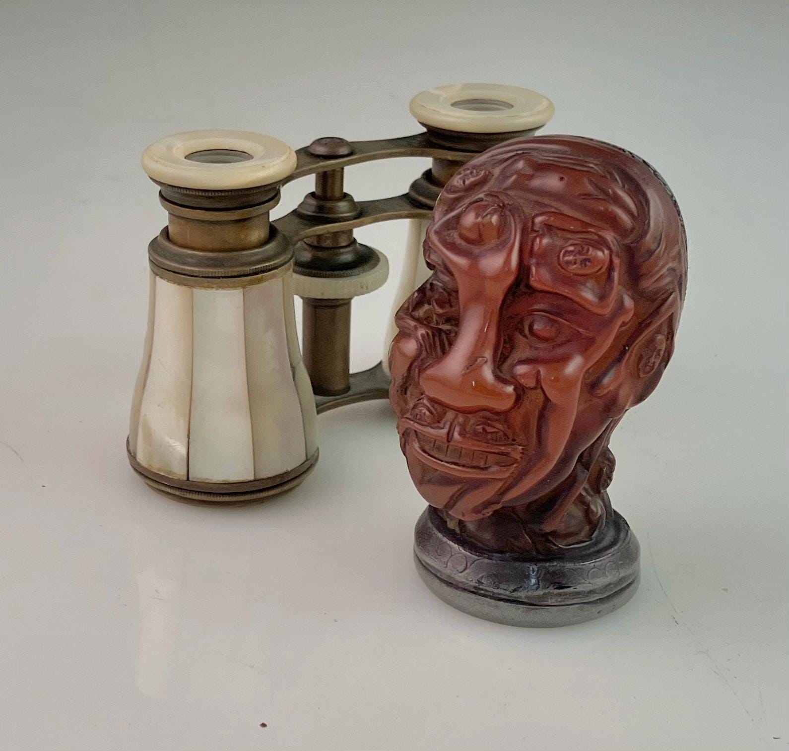 A Japanese Erotic Head sculptur