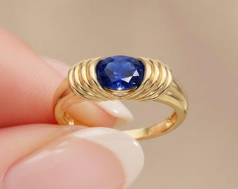 14K Gold Blue CZ Signet Ring: Oval Bezel Dome Band, September Birthstone