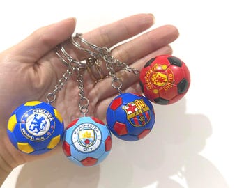 Mini llavero de balón de fútbol: un colorido amuleto de fútbol, accesorio deportivo para bolso o llave.