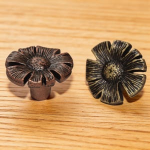 May include: A set of three ceramic mugs with a speckled, matte finish. The mugs are in shades of cream, light gray, and dark gray. Each mug has a simple, minimalist design, perfect for coffee or tea.