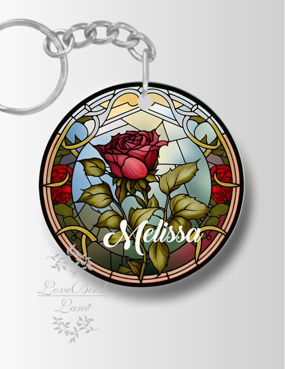 La Bella y La Bestia Enchanted Rose Stained Glass Llavero Zipper