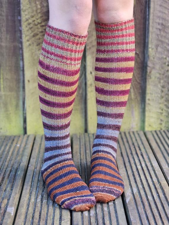 Knee high striped merino socks in bright jewel colours. Handknitted from luxury high quality yarns from Urth Yarn Uneek. PRE-KNITTED SOCKS.