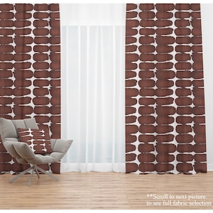 May include: Two brown curtains with a white background and a geometric pattern. The curtains are hanging in a window. There are four smaller images of different patterns in the bottom right corner of the image. The text "*Scroll to next picture to see full fabric selection" is at the bottom of the image.