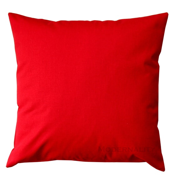 red throw pillows with birds