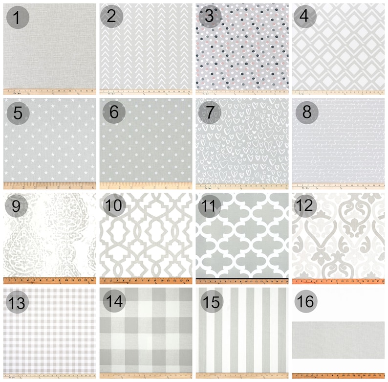 May include: A collection of 16 different grey and white fabric swatches with various patterns, including polka dots, hearts, stars, and geometric designs.