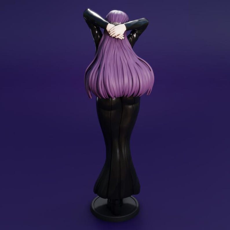 May include: A black figure of a person with long, flowing purple hair, arms crossed behind the head. The figure is wearing a black outfit and stands on a circular base against a dark purple background. The figure is a statue.