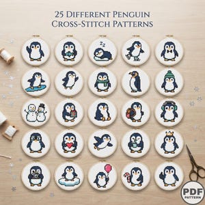 Peut inclure: Une collection de 25 modèles de point de croix de pingouins présentés dans des tambours à broder circulaires en bois. Le texte 25 Different Penguin Cross-Stitch Patterns est centré en haut et un logo PDF Pattern est en bas à droite.