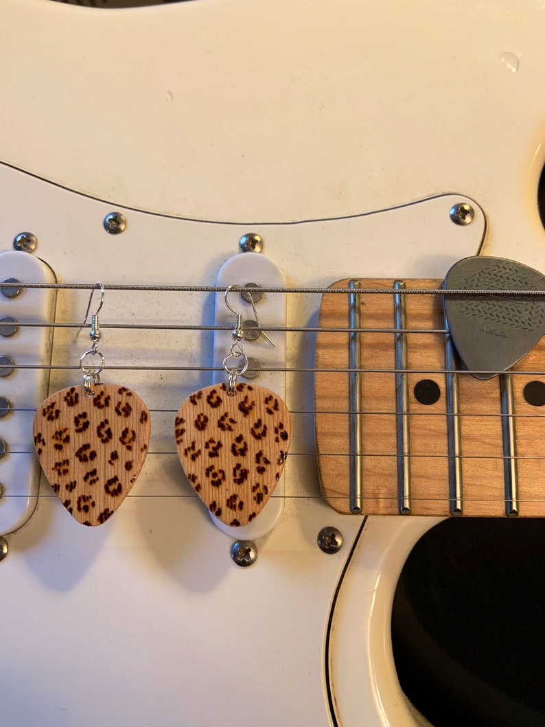 Guitar pick leopard print earrings