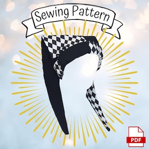 May include: A sewing pattern for a jester-style headpiece featuring a black and white diamond harlequin pattern combined with solid black fabric sections. The design includes long, pointed fabric tails and a banner reading Sewing Pattern.