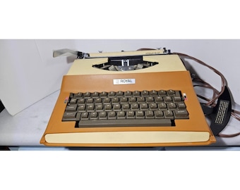 Máquina de escribir eléctrica Litton Royal Apollo 10 GT MODELO SP8000 antigua con estuche.