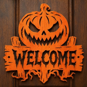 May include: A bright orange wooden wall sign featuring a carved jack-o'-lantern with a jagged, menacing facial expression positioned above a rectangular plank that displays the word WELCOME in bold, black, stylized, sharp-edged lettering.