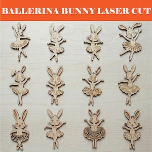 Może przedstawiać: Laserowo wycięte drewniane ozdoby z baletniczymi króliczkami. Każdy króliczek jest przedstawiony w pozie baletowej, w tutu. Tekst "BALLERINA BUNNY LASER CUT" znajduje się u góry. Idealne na Wielkanoc lub do dekoracji pokoju dziecięcego.