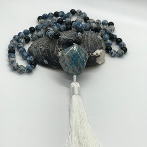 Mala prayer beads created with blue spotted agate beads
