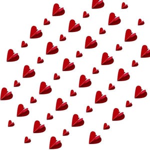 May include: A collection of numerous three-dimensional red paper hearts scattered across a white background. Each heart features a central vertical fold with a visible dotted line, creating a layered effect that gives the shapes depth and dimension.