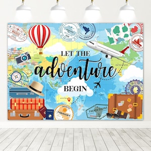 May include: A travel-themed backdrop featuring a world map with stamps, a hot air balloon, and an airplane. The words "LET THE adventure BEGIN" are prominently displayed. Suitcases, a camera, and sunglasses are also included.