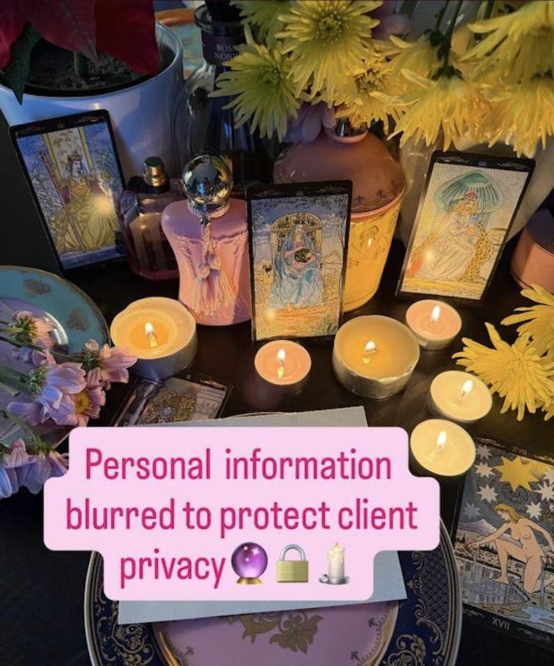 May include: A still life arrangement featuring tarot cards, lit candles, and a pink perfume bottle. The scene includes yellow flowers and a decorative plate. Text on a pink banner reads "Personal information blurred to protect client privacy."