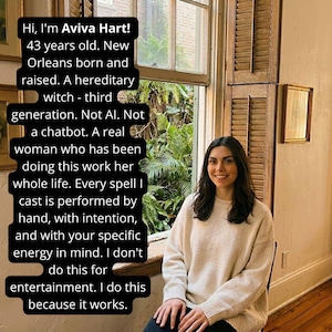 May include: A woman with long dark hair wearing a cream-colored sweater sits near a window. Text on the left reads: "Hi, I'm Aviva Hart! 43 years old... A hereditary witch... I don't do this for entertainment. I do this because it works."