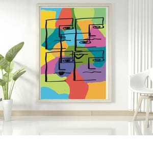 May include: A rectangular wall art print in a light wood frame featuring four abstract faces outlined in black ink. The background consists of overlapping organic shapes in vibrant shades of yellow, red, lime green, blue, pink, and purple.