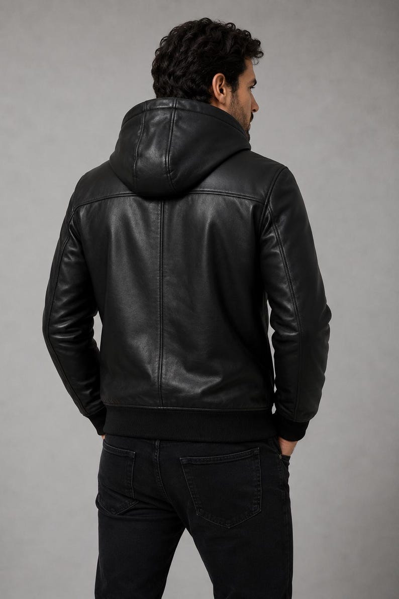 Back view of men's black leather hooded jacket with hood and smooth leather finish