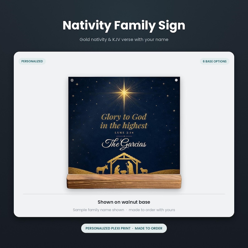 May include: A square plexiglass sign featuring a gold nativity scene and the text Glory to God in the highest Luke 2:14 The Garcias set against a dark blue starry background. The sign is mounted on a rectangular wooden walnut base.