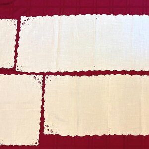 Set Of Four Vintage cotton table runners / place mats in various sizes.