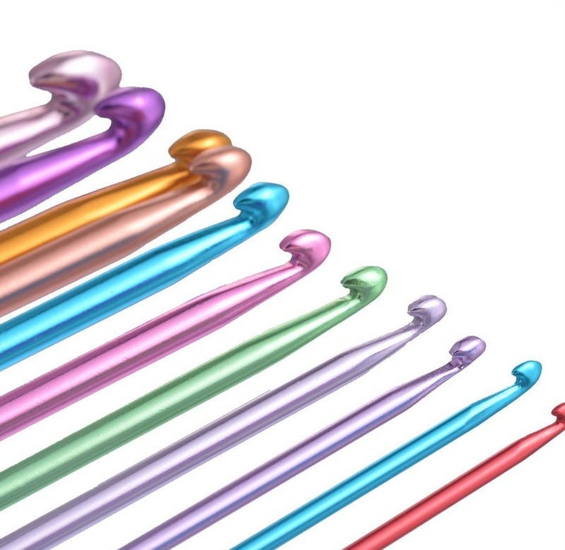 May include: A set of ten colorful crochet hooks, arranged in a diagonal line, with the largest hook at the top and the smallest hook at the bottom. The hooks are made of metal and have a shiny finish.