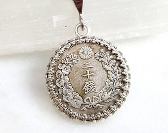 Antique Japanese silver coin necklace. Meiji period silver coin. Heirloom jewelry. Sunburst necklace. Sterling silver bezel. Kanji necklace.