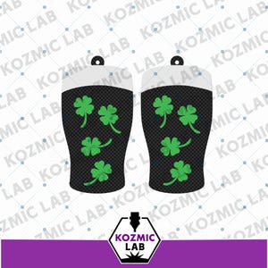May include: Two black and white St. Patrick's Day themed earrings with a shamrock design. The earrings have a black base with green shamrocks and a white top. The text "KOZMIC LAB" is visible in the image.