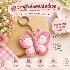 Peut inclure: Un porte-clés papillon au crochet en fil rose et blanc, attaché à un anneau en métal argenté. L'image contient le texte : craftedneststudioo, INSTANT DOWNLOAD, Step by Step Guidance, Cute & Easy Pattern, PDF Pattern Included, Beginner Friendly.