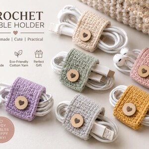 May include: A collection of six crochet cable holders in beige, sage green, pink, lavender, gray, and mustard yellow. Each rectangular holder features a small, round wooden button engraved with a heart, securing white charging cables.