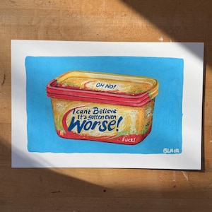 May include: A colorful illustration of a butter container with the text "I can't believe it's gotten even worse!" and "Oh No!" on a blue background. The word "Fuck!" is also visible. The artist's signature is in the bottom right corner.