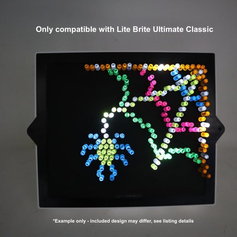 May include: A black Lite Brite board displaying a colourful spider and web design created with small, illuminated pegs. The text at the top reads "Only compatible with Lite Brite Ultimate Classic". The bottom text reads "*Example only - included design may differ, see listing details".